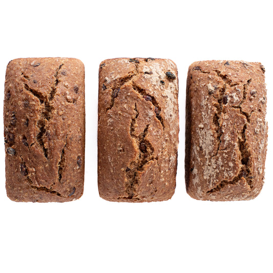 Organic gluten-free sourdough loaves packed for shipping in the Leaven and Love Family Bread Box